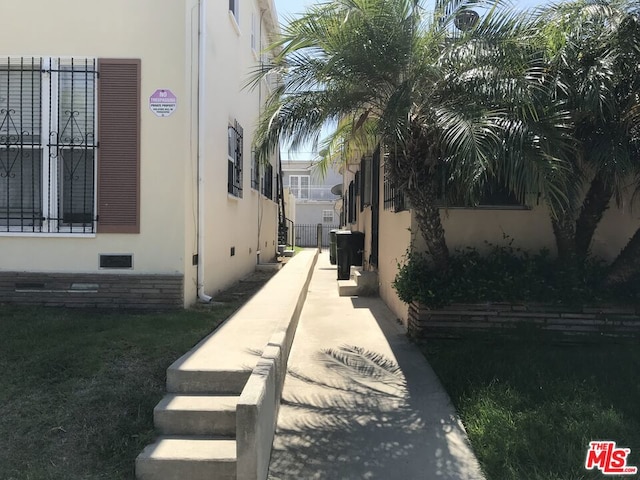 view of home's exterior with central AC unit