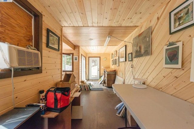 interior space with wood walls, cooling unit, and wooden ceiling