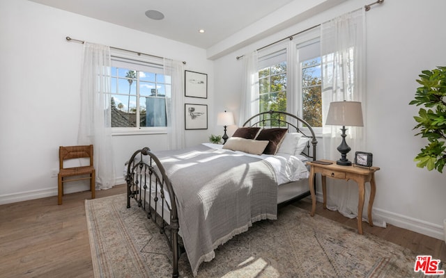 bedroom featuring hardwood / wood-style floors