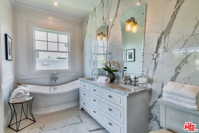 bathroom featuring a tub to relax in, vanity, and crown molding