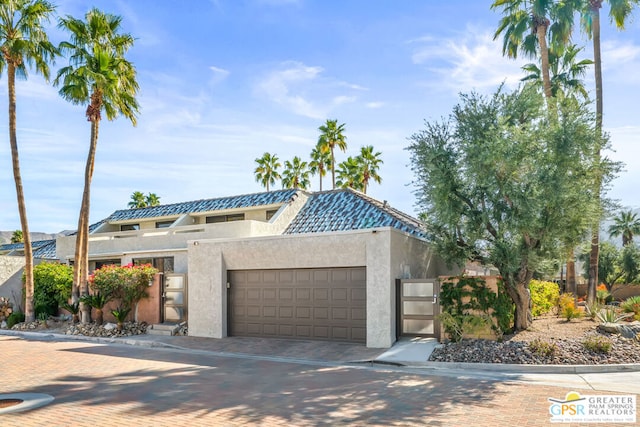 view of front of home with a garage