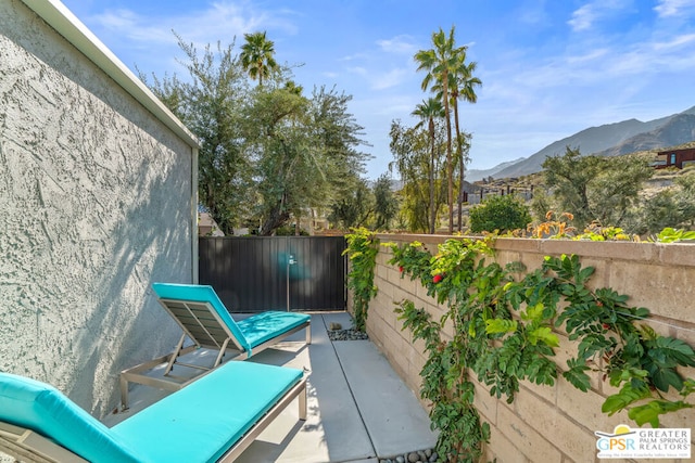 view of patio with a mountain view