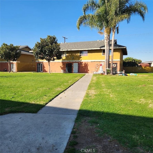 view of front of house with a front lawn