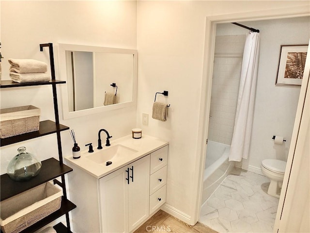 full bathroom with shower / bath combination with curtain, toilet, and vanity