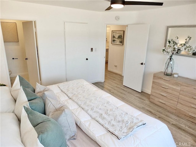 bedroom featuring ceiling fan and light hardwood / wood-style flooring