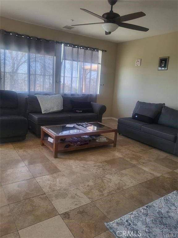 living room with ceiling fan