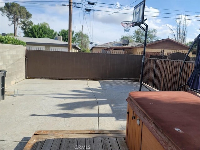 view of patio / terrace with basketball court