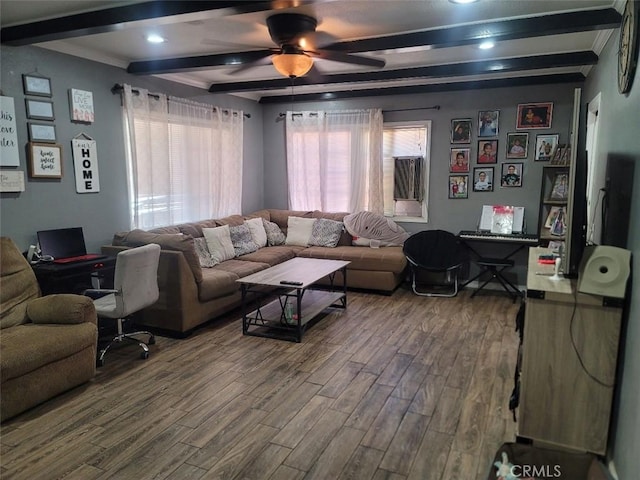 living room with beamed ceiling, ceiling fan, and hardwood / wood-style floors