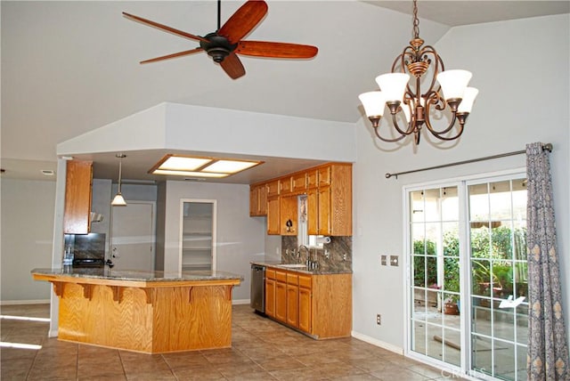 35777 Rd 606, Raymond, CA 93653 - kitchen featuring stainless steel dishwasher, a peninsula, a sink, light tile patterned floors, and backsplash