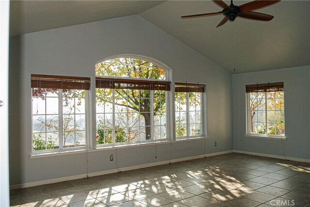 35777 Rd 606, Raymond, CA 93653 - tiled spare room featuring plenty of natural light, ceiling fan, baseboards, and high vaulted ceiling