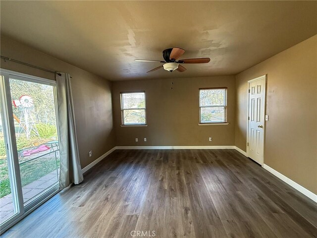 35777 Rd 606, Raymond, CA 93653 - empty room with baseboards, dark wood finished floors, and ceiling fan
