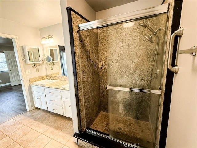 35777 Rd 606, Raymond, CA 93653 - bathroom featuring a stall shower, tile patterned flooring, and vanity