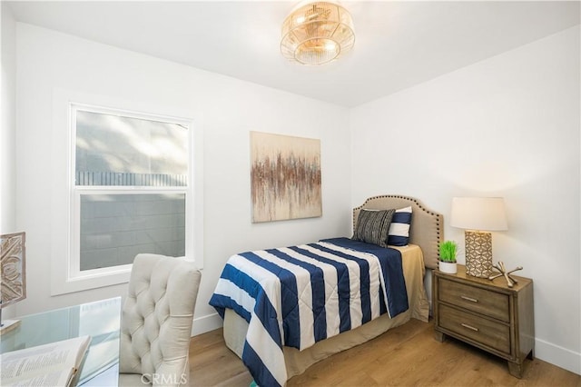 bedroom featuring light wood-type flooring