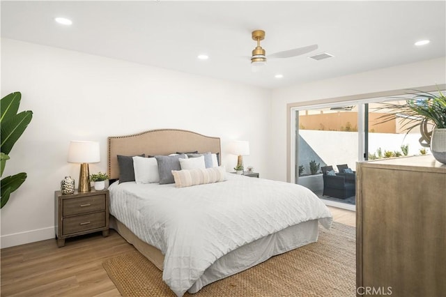 bedroom with ceiling fan, access to exterior, and light hardwood / wood-style floors