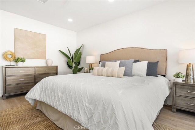 bedroom featuring light hardwood / wood-style flooring