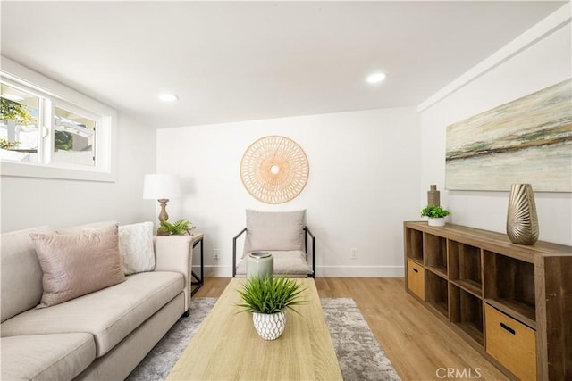 living room with light hardwood / wood-style floors