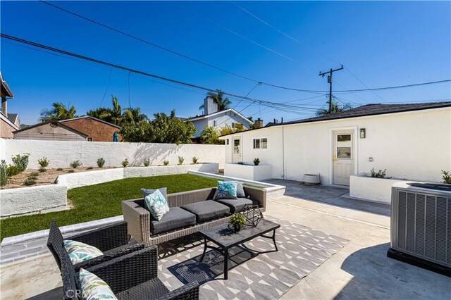 view of patio featuring outdoor lounge area and central AC unit