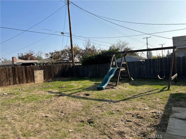 view of yard featuring a playground