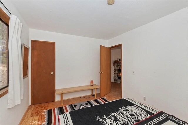 bedroom with light wood-type flooring