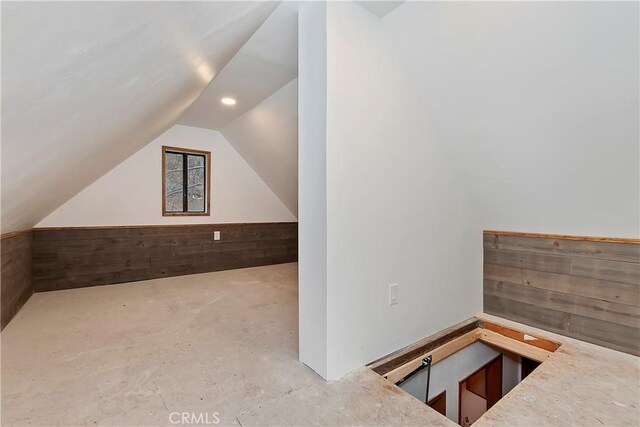 bonus room featuring vaulted ceiling