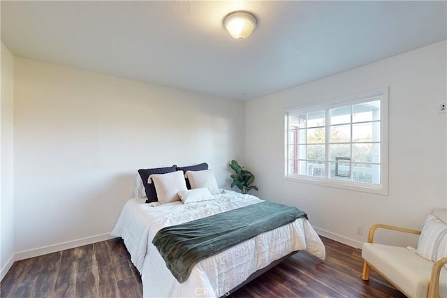 bedroom featuring dark hardwood / wood-style floors