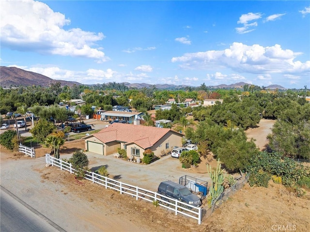 drone / aerial view featuring a mountain view