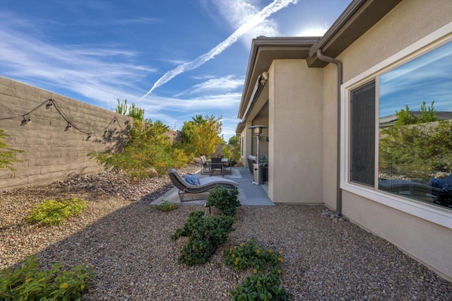 view of yard with a patio area