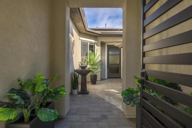 property entrance with a patio