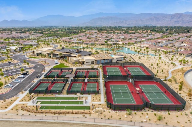 birds eye view of property with a mountain view