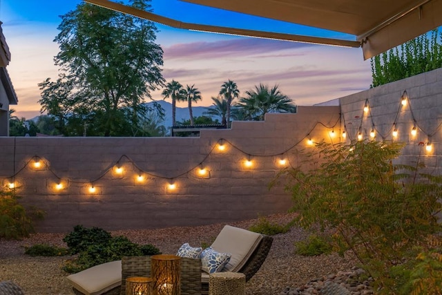 yard at dusk with a mountain view