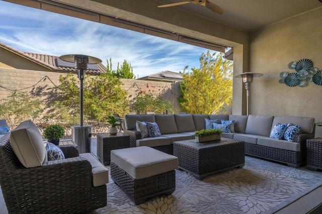 view of patio featuring ceiling fan and an outdoor hangout area