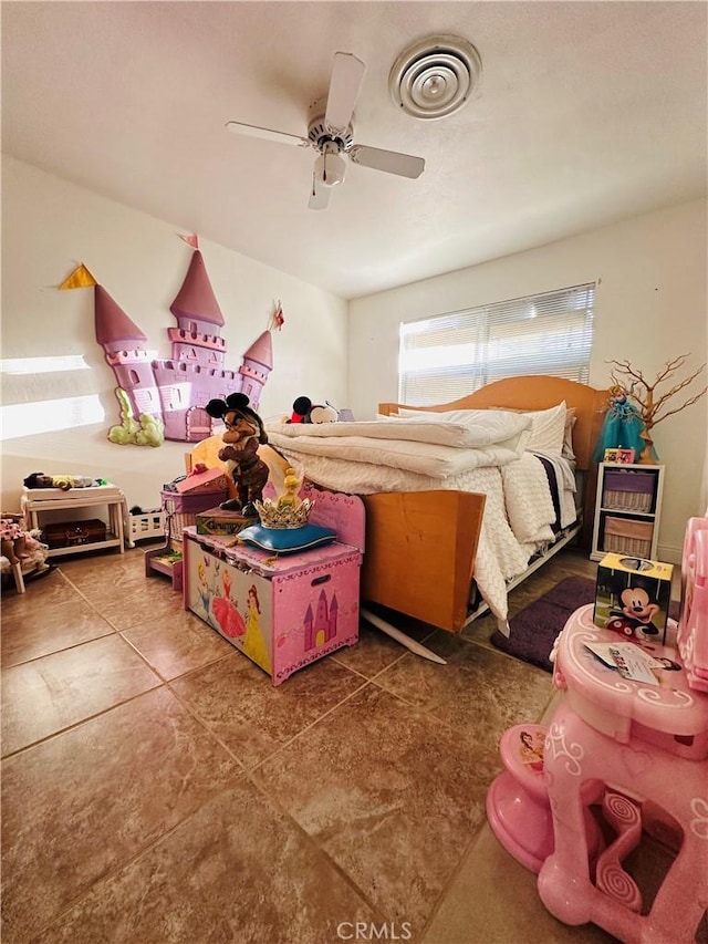 bedroom featuring tile patterned floors and ceiling fan