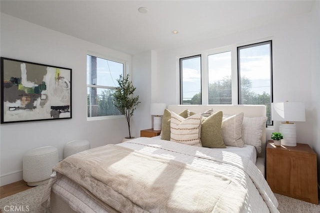 bedroom featuring hardwood / wood-style flooring