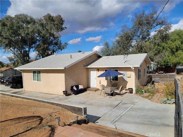 back of house featuring a patio