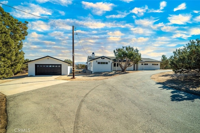 ranch-style home featuring a garage