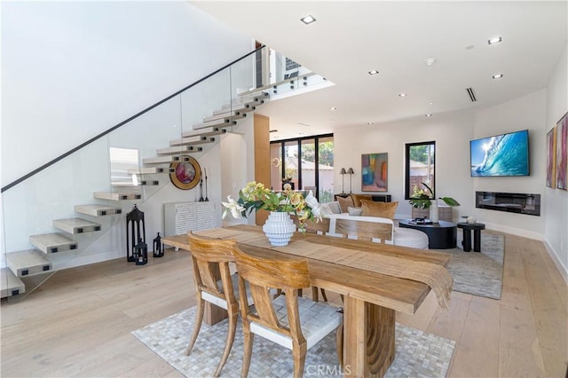 dining space featuring light hardwood / wood-style flooring