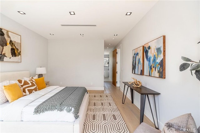 bedroom featuring light hardwood / wood-style flooring