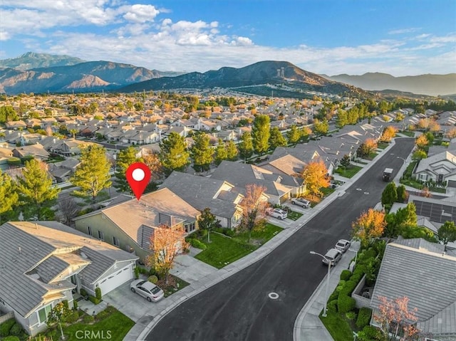 birds eye view of property featuring a mountain view