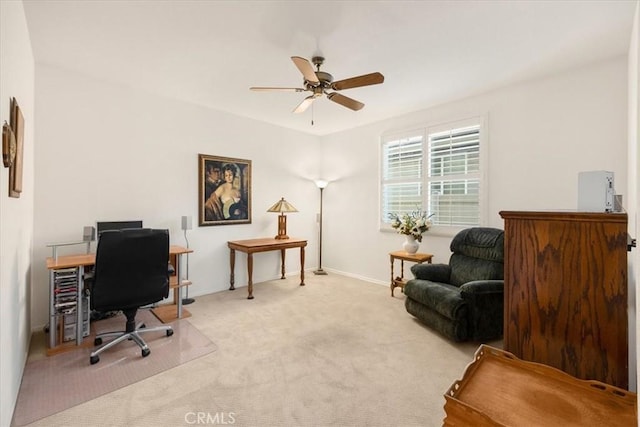 carpeted office with ceiling fan