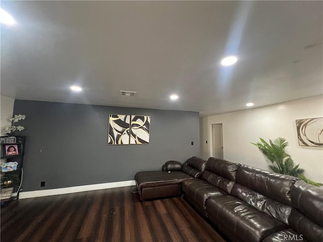 living room featuring dark wood-type flooring