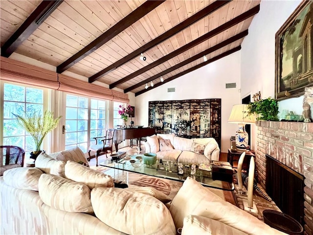 living room featuring high vaulted ceiling, a fireplace, visible vents, wood ceiling, and beamed ceiling