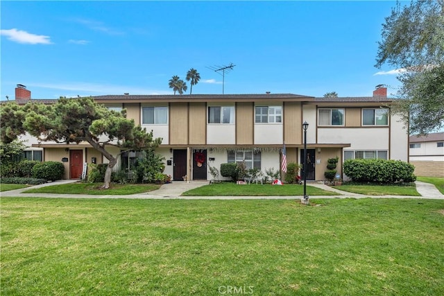 view of front of house with a front yard