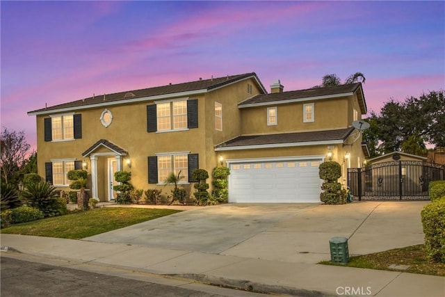 view of front of home with a garage