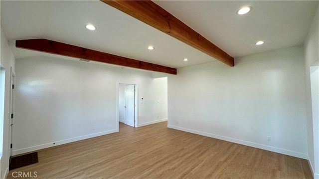 spare room with baseboards, light wood-style floors, beam ceiling, and recessed lighting