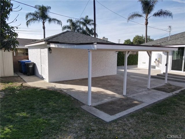 view of parking with fence