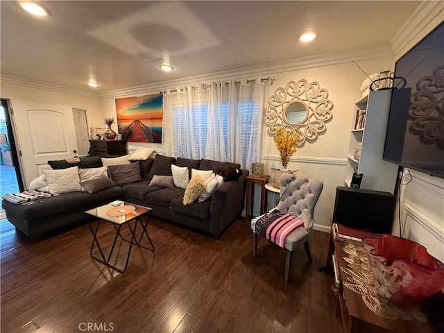 living room featuring dark hardwood / wood-style floors and crown molding