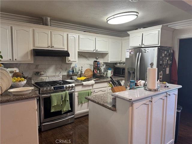 kitchen with white cabinets, dark wood-type flooring, and appliances with stainless steel finishes