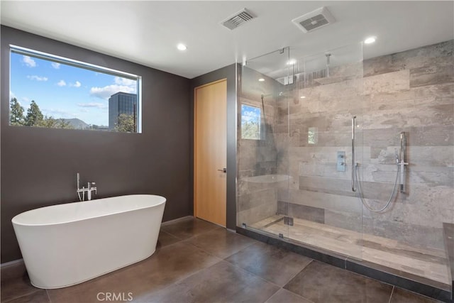 bathroom featuring plus walk in shower