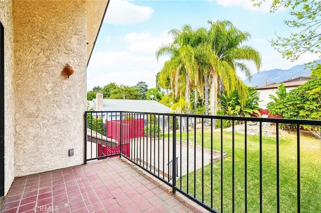 balcony featuring a mountain view