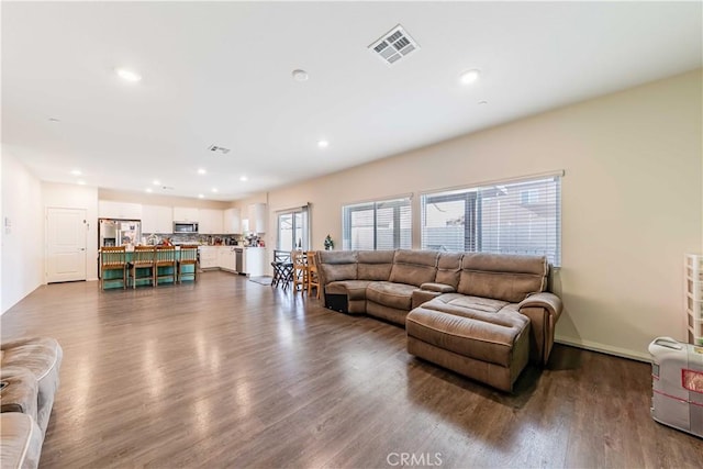 living room with wood-type flooring